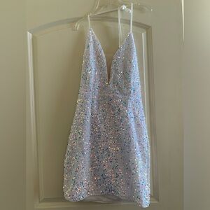 White sequin mini dress with lace up back